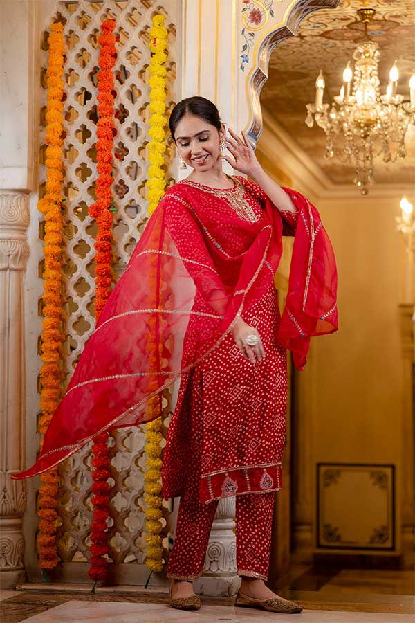 Stitched in Style: Red Rayon Suit with Bandhini Print and Zari Embroidery
