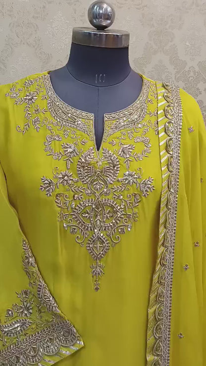 PARTY WEAR YELLOW SUT WITH PURE SIKL ZARI WORK GHARARA AND DUPATTA IS  ALSO BASE ON PURE SILK FABRIC